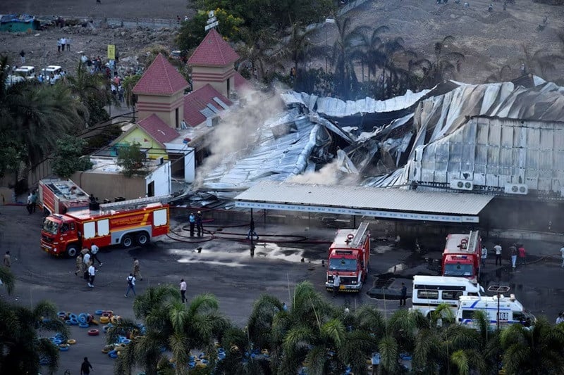 rescuers at a burned gaming zone after a fire in rajkot in the western state of gujarat india may 25 2024 photo reuters